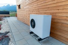 Outdoor air conditioner unit ready for the hot season. Provides fresh, cool air for the home during warm summer days.